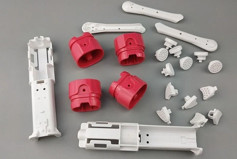 Motivi della deformazione delle parti dello stampaggio ad iniezione di plastica